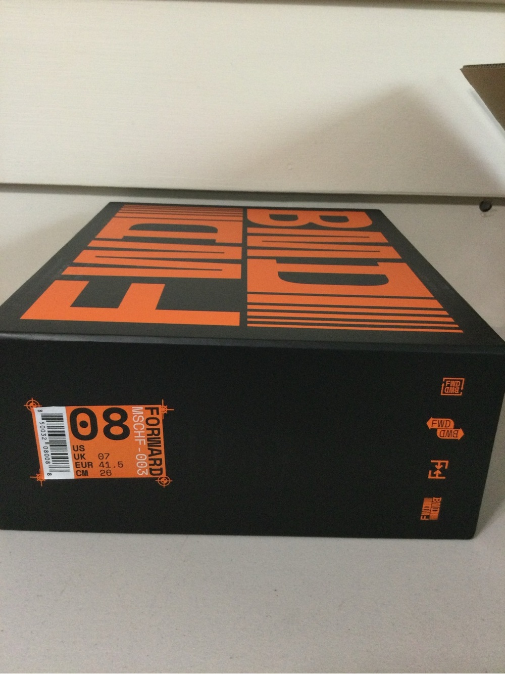 MSCHF Black and Orange Graphic Shoe Box - Bold Typography